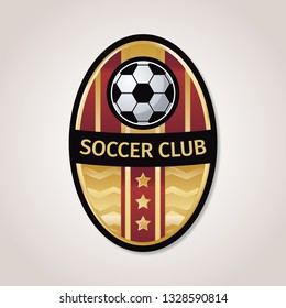 Golden soccer or football badge with black and gold star combination.