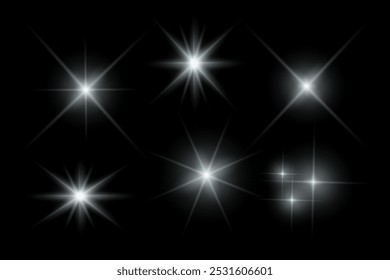 Golden sparkle  lights, flashing lights, light effects, sunlight lens flare, glowing ray beams, sparkling starsicon on black background.