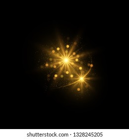 Golden sparkles. Glowing magic lights isolated on black background.