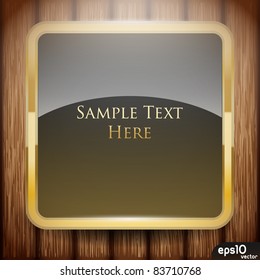 Golden square label on wooden planks