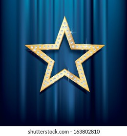 golden star with diamonds on blue velvet