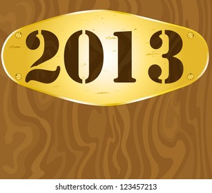 Golden steel sign on wood