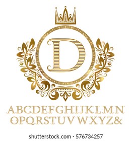 Golden striped letters with initial monogram in coat of arms form. Shining font and elements kit for logo design.
