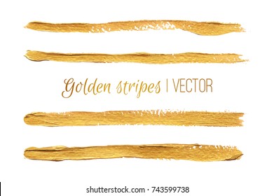 Golden stripes painted with a brush on a white background. Isolated vector for design greeting card, wallpaper, packaging and posters in a luxurious style