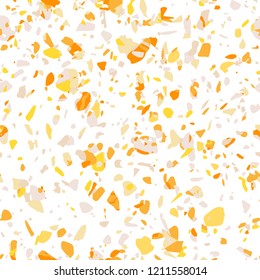 Golden terrazzo flooring seamless pattern. Background with textured surface