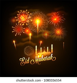 Golden text Eid Mubarak with mosque on fireworks night background.