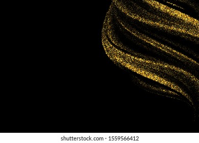 
Golden texture. Splash of golden dust particles on a black background.
