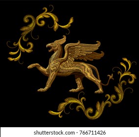 Golden textured embroidery griffin textile patch design. Fashion decoration ornament fabric print. Gold on black background legendary mythic fairy character lion eagle vector illustration