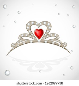 Golden tiara with diamonds and faceted red stone on white background