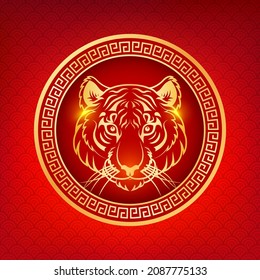 Golden Tiger Head in Round Decorative Ornament a Red Background Symbol of Asian New Year for Card. Vector illustration