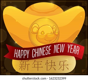 Golden traditional ingot decorated with a smiling rat face, greeting ribbon and greeting sign to celebrate Chinese New Year (written in Chinese calligraphy).