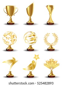 Golden Trophy Cups and Awards  in the form of  abstract shapes with the stars and lines, Laurel wreath, bird and Superman. Realistic vector set, illustration isolated on white background.