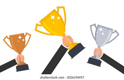 Golden trophy. Hand holding the winner's cup. A symbol of success, victory, championship, business goals achievement, leadership idea. Sports trophy. Prize of the winners