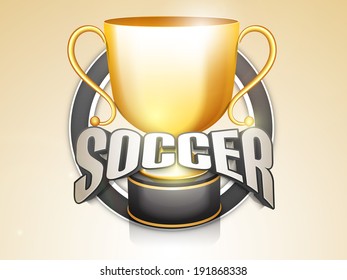 Golden trophy for soccer ball winner with stylish text soccer on brown background. 