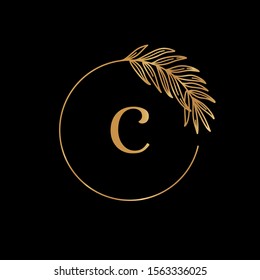 Golden tropical palm leaf frame. Round Icon in trendy minimal linear style. Vector Emblem with letter C and Palm Branch. Template for logo cosmetics, beauty Studio, hairdresser, hand made, jewelry