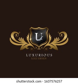 Golden  U Logo Luxurious Shield, creative vector design concept for luxury business indentity.