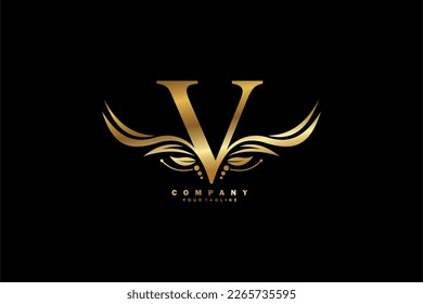 Golden V letter logo design with wing shaped feather ornament. monogram emblem, typography logo. initial letter.suitable for logos of business, boutique, company, fashion, hotel, etc