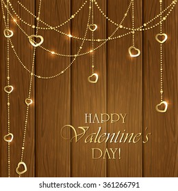 Golden Valentines decorations with hearts on wooden background, illustration.