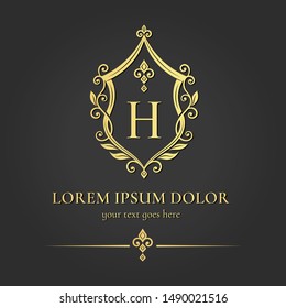 Golden vector emblem. Elegant, classic vector. Can be used for jewelry, beauty and fashion industry. Great for logo, monogram, invitation, flyer, menu, brochure, background, or any desired idea.