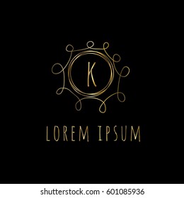 Golden vector frame with letter K