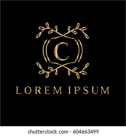 Golden vector monogram. Letter C logo design template