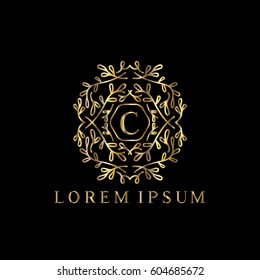 Golden vector monogram Letter C logo design template with floral ornaments