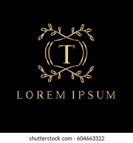 Golden vector monogram. Letter T logo design template