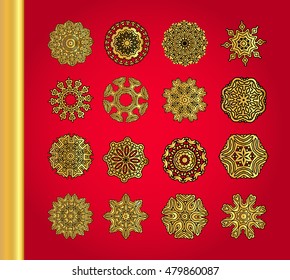 Golden vector snowflakes on red background. Set of ornate mandala symbols. 
