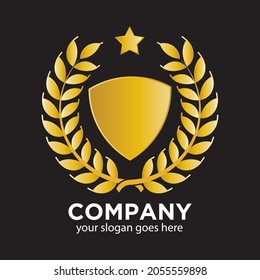 golden vector wreath with a shield isolated in black background