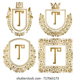 Golden vintage monograms set. Heraldic logos with letter T.