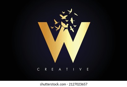 Golden W Logo Letter with Flying Flock of Birds Disintegrating from the Letter. W Gold Texture Letter with Bird Fly Letter Icon.