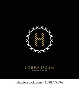Golden and white vector frame with letter H