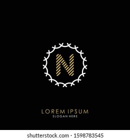 Golden and white vector frame with letter N