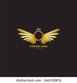 escudo alado dorado con logo de la corona / símbolo heráldico