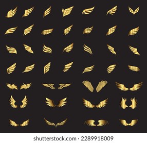 golden wings set on black background. Set of gold wings logo element vector