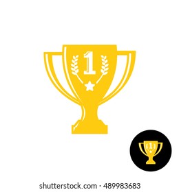 Golden winner cup trophy logo. First prize symbol.