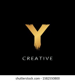 Golden  Y  Brush Stroke  Logo design. Golden Paint Logo Letter Icon with Elegant  brush shape Vector Design concept.