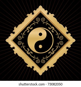 golden ying yang in ornate frame