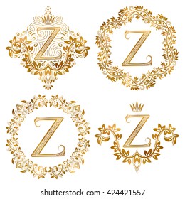Golden Z letter vintage monograms set. Heraldic coats of arms and round frames.