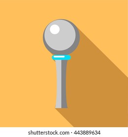 Golf ball on a tee icon in flat style on a pale orange background