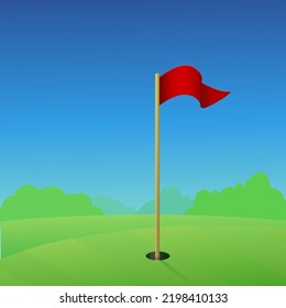 Un hoyo de golf y su bandera roja en el verde de un campo de golf bajo un cielo azul