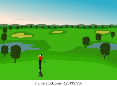 Golfers are hitting the ball on the golf course. There are mountains and sky in the background.