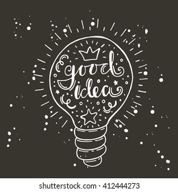 Good idea. Quote in the light bulb. Hand drawn vector illustration on the chalkboard. Lettering. Modern calligraphy. T-shirt, poster, banner, badge, emblem, sticker, placard, motivation.