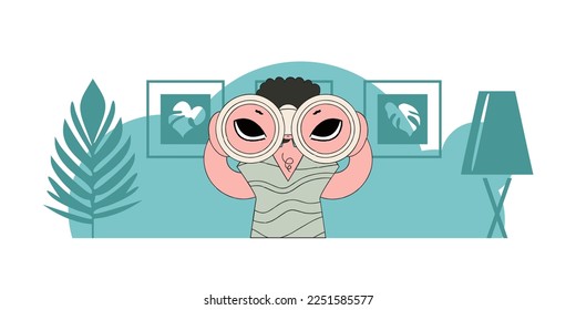 Good for job postings and flyers. A young man holds in his hands and looks through binoculars.