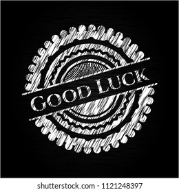 Good Luck chalk emblem written on a blackboard