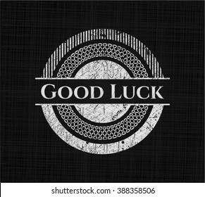 Good Luck chalk emblem written on a blackboard