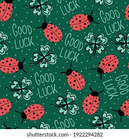 Good luck charms talisman seamless vector background. Ladybug, four-leaf clover, Good Luck lettering repeating hand drawn fortune pattern green. For New Years, fabric, packaging. Vector illustration.