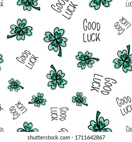 Good luck hand drawn lettering and clover leaves on white seamless vector pattern. Four-leaf clover, Good Luck quote repeating fortune background. Use for New Years, fabrics, packaging