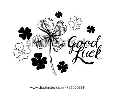 Good luck. Hand drawn lettering with four-leaf clover. Vector