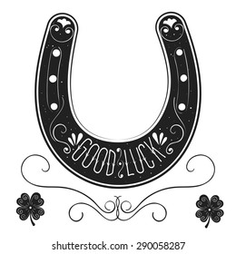 Good luck horseshoe amulet and four leaf clover with decorative 